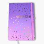 Purple to pink ombre hardcover notebook with gold foil notes and ideas lettering