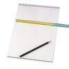 Ruler on white notepad with pencil .