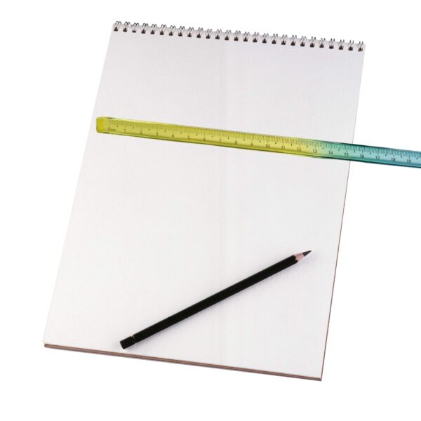 Ruler on white notepad with pencil .