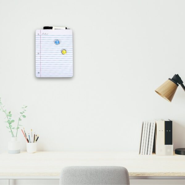 Whiteboard with marker and magnets.