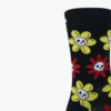 Close-up: Close-up of floral skull details on black Sock Doctor socks