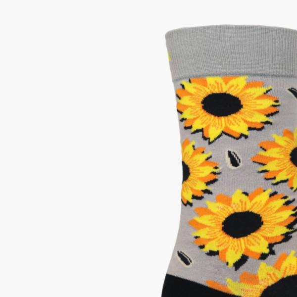 Close-up: Close-up of sunflower design on grey novelty socks
