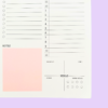 Close-up of pink A5 daily planner meal and water intake tracker